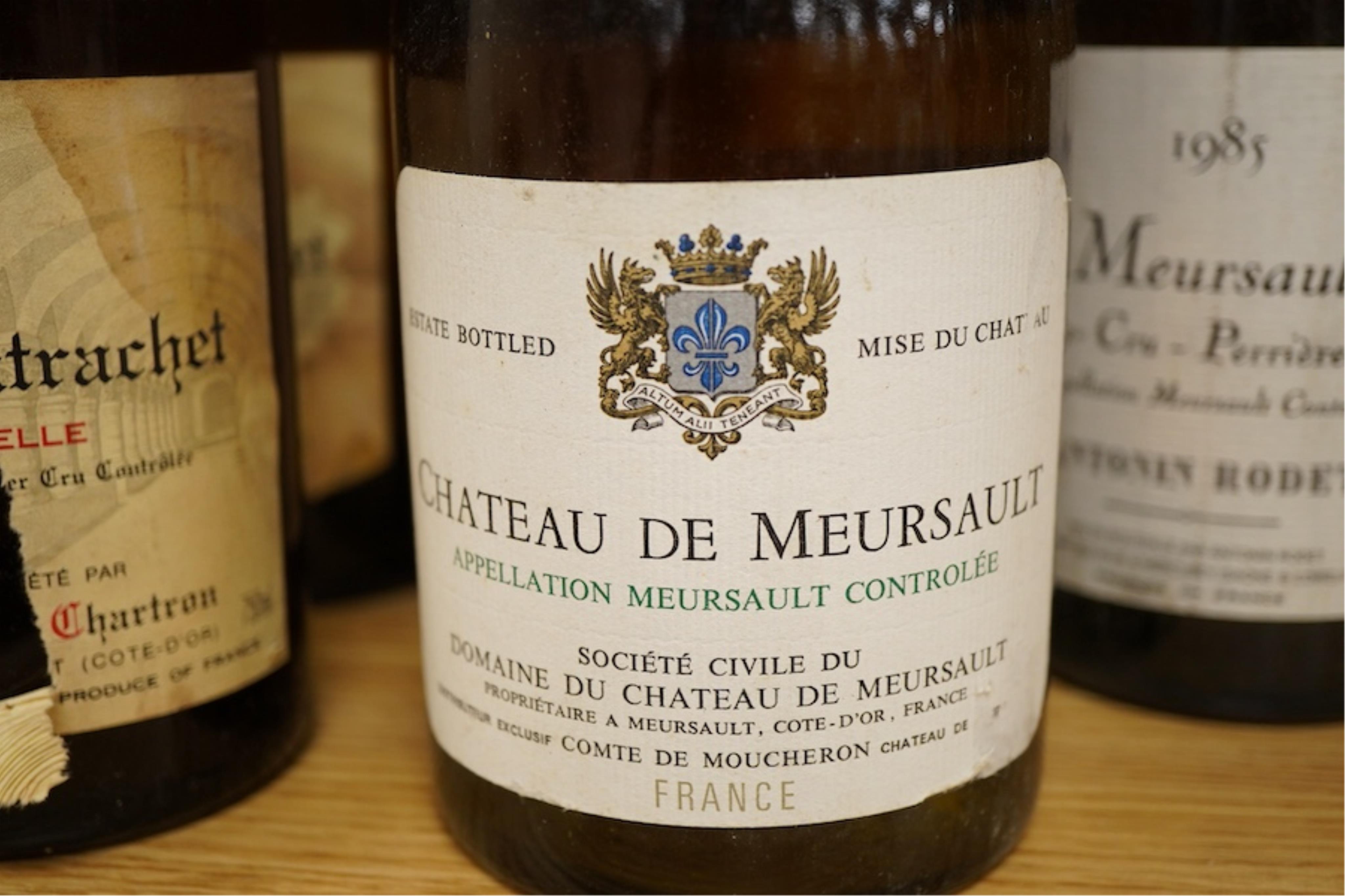 Eleven bottles of white burgundy including three Jean Chartron Puligny-Montrachet Premier Cru, 1985, two Antonin Rodet Meursault 1er Cru Perrieres, 1985, four various Puligny-Montrachet, a Domaine du Chateau de Meursault